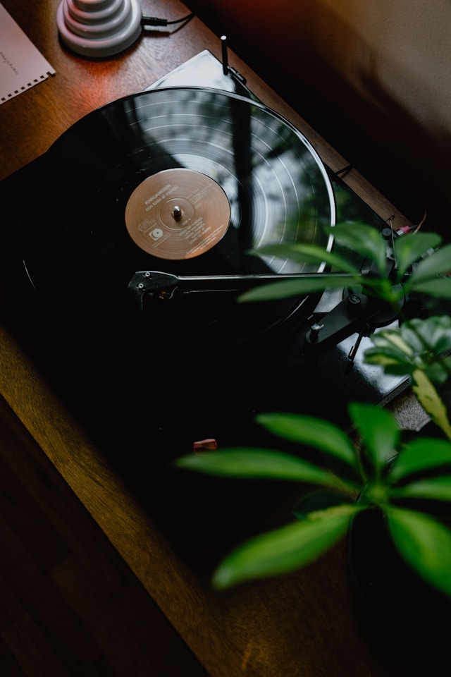 Vintage turntable playing a record
